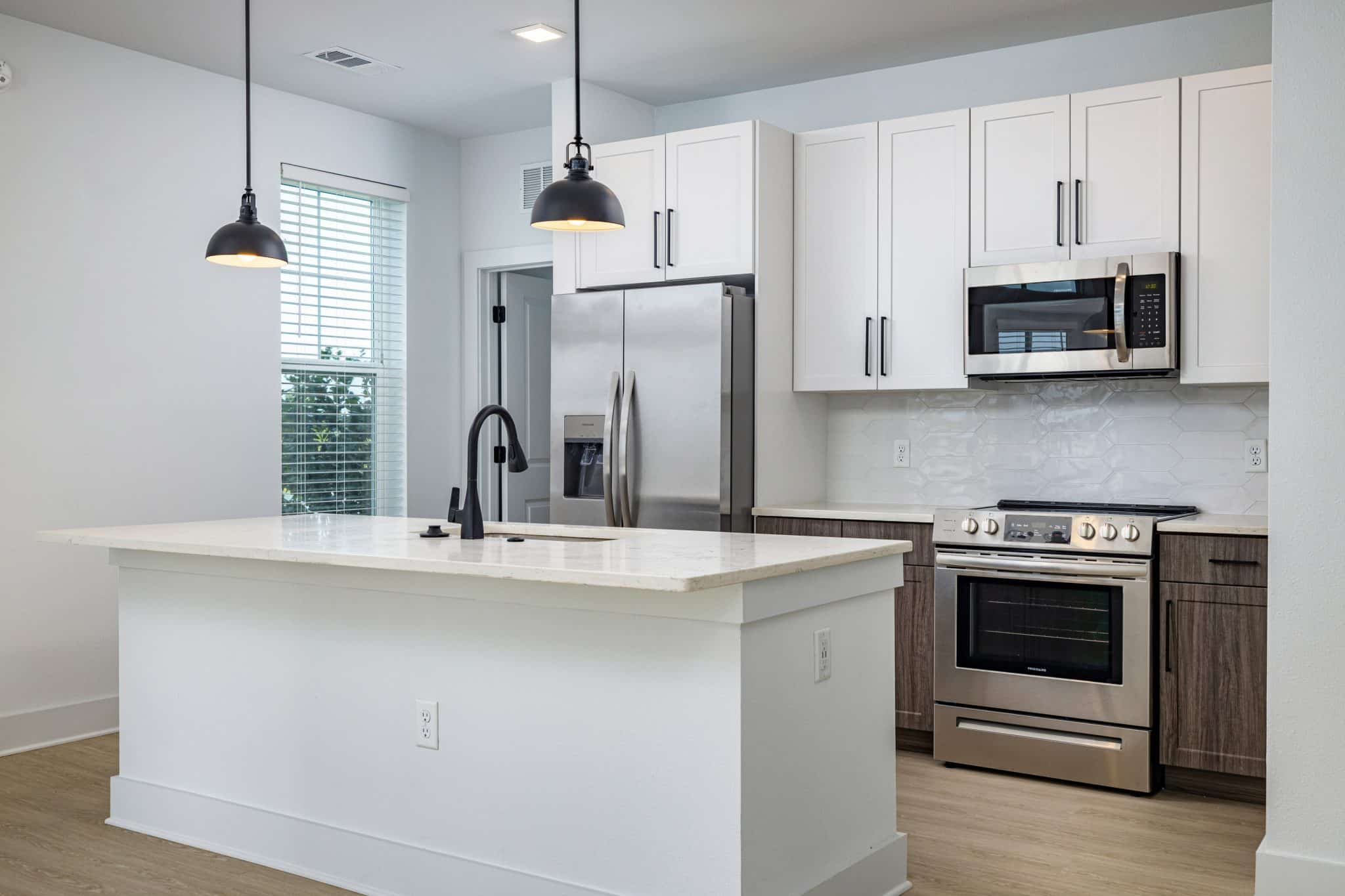 Kitchen islands in apartment units at the Ridley at Waterset